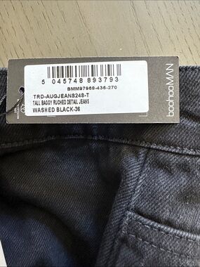 boohooMAN Tall Baddy Ruched Detail Jeans in washed black.